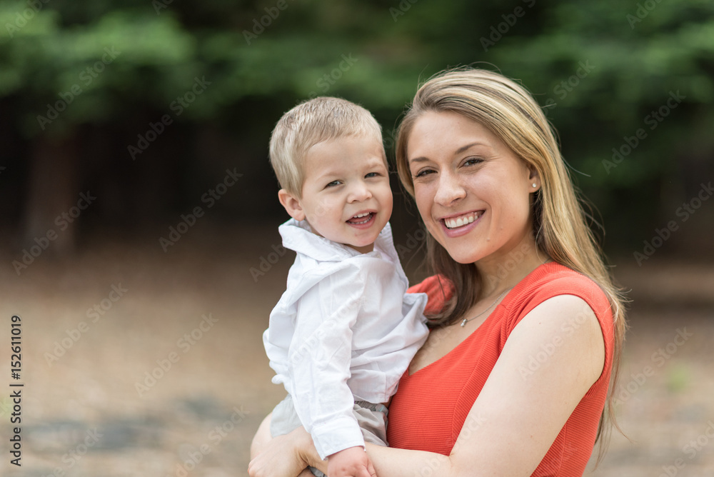 Cute Millennial Mom Holding Toddler Son Cute Millennial Mom Holding Toddler Son