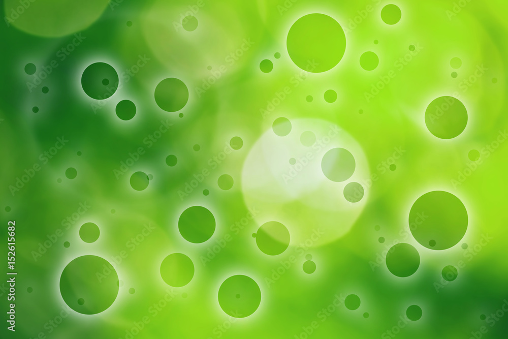 Beautiful blurred abstract circle pattern on the green nature background.