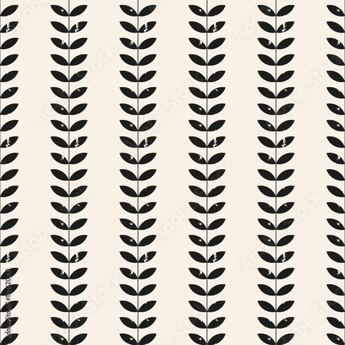 Seamless floral pattern with distressed look twigs and leaves in black on beige background. Scandinavian style design. EPS 8 stock vector.