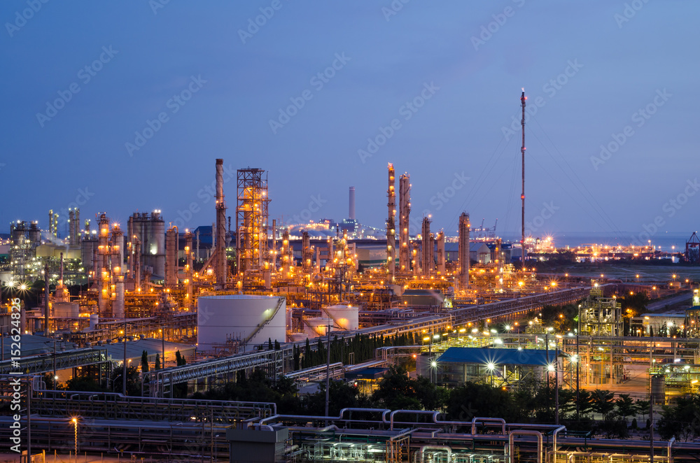 petrochemical plant at twilight with blue sky