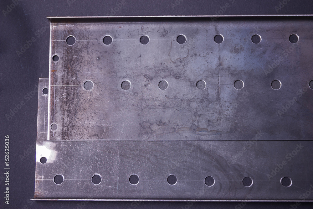 Metallic abstract. Core of an injection moulding die, in close-up. Industrial background. Metallic abstract. Core of an injection moulding die, in close-up. Industrial background.