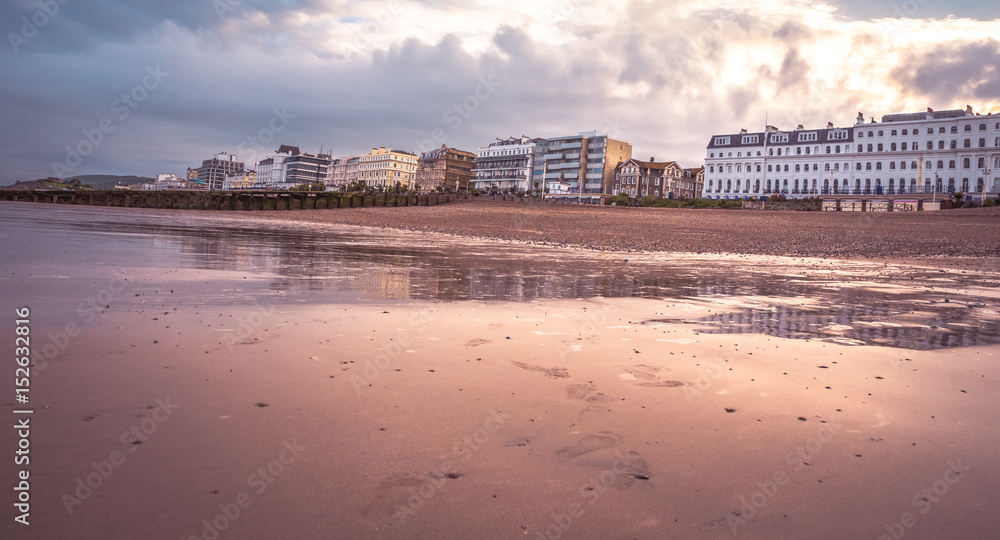 Eastbourne  , East Sussex, England. Eastbourne beach at the low tide on sunset