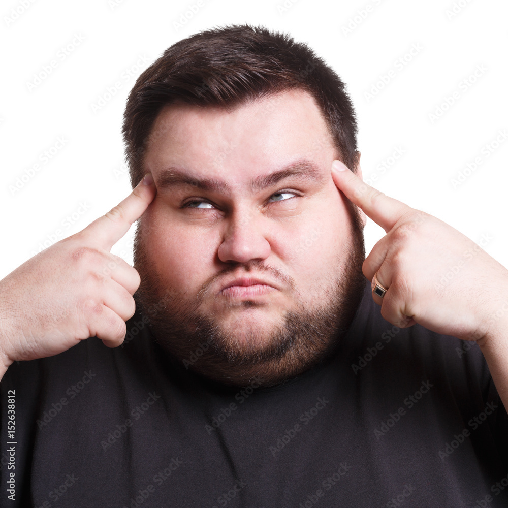 Man suffering from headache, isolated shot Man suffering from headache, isolated shot