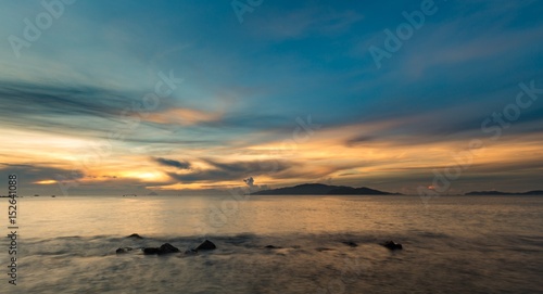 Vietnam Nha Trang bay just after sunrise with a strikingly beautiful colour filled sky.