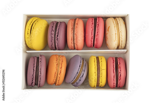 Box of French macaron cookies isolated on white