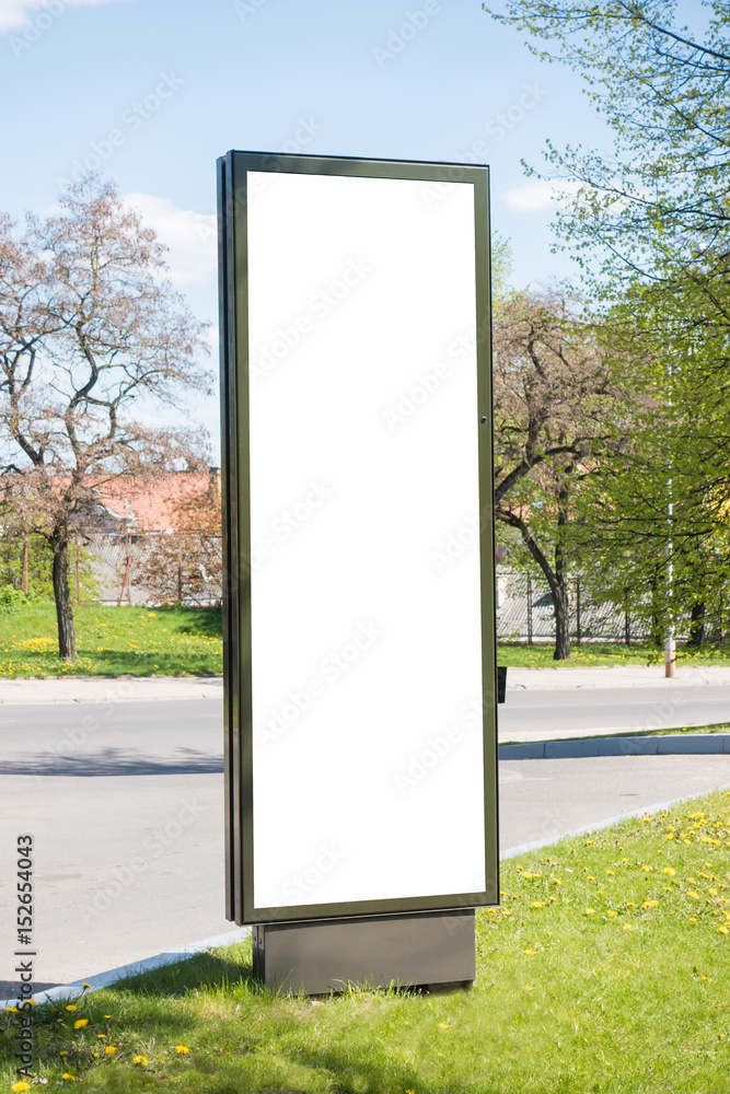 Advertising column mockup. Public information board in the street. Advertising column mockup. Public information board in the street.