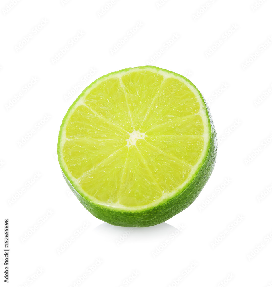 A half of lime citrus fruit with drop isolated on white background