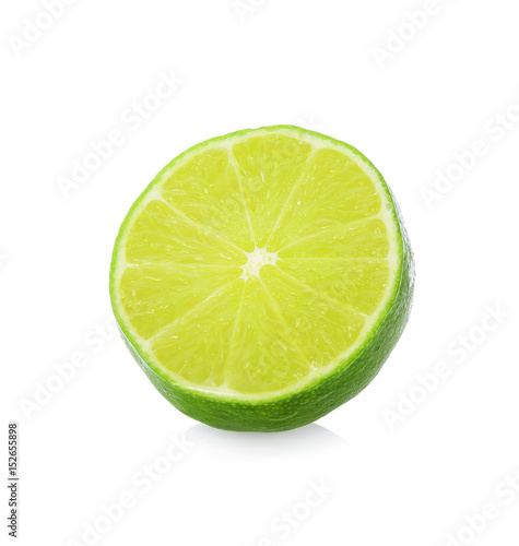 A half of lime citrus fruit with drop isolated on white background