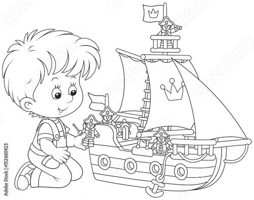 Little boy playing a toy sa...