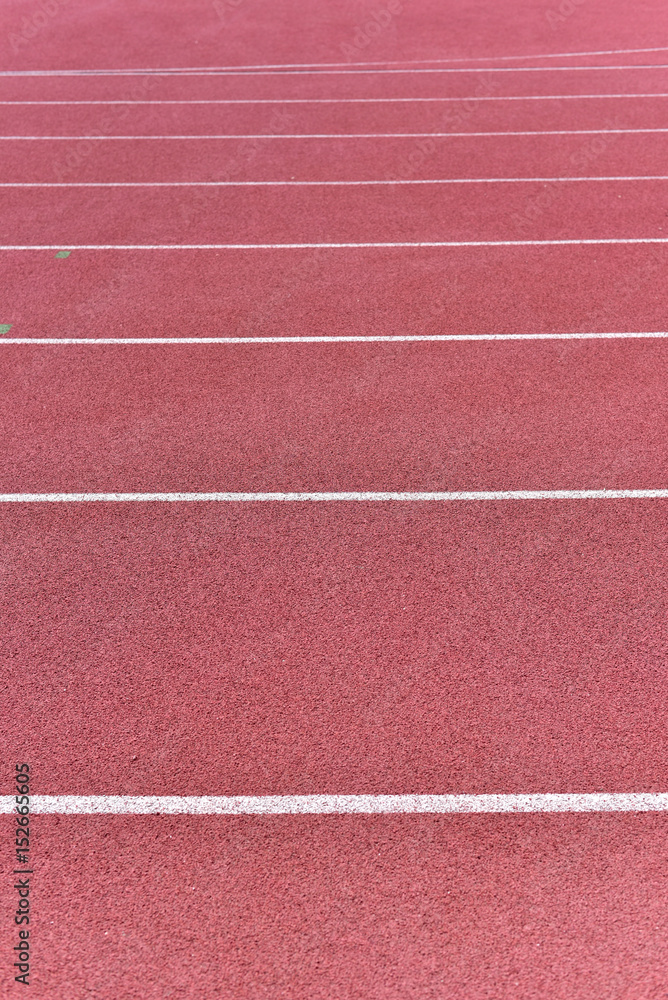 Athletics stadium running track red lines marks