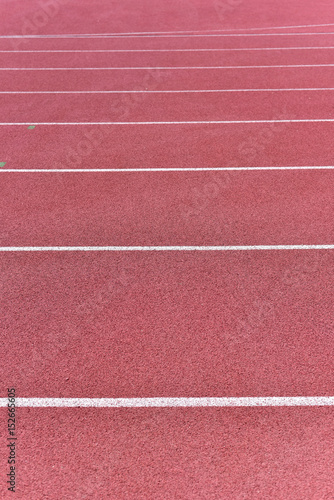 Athletics stadium running track red lines marks