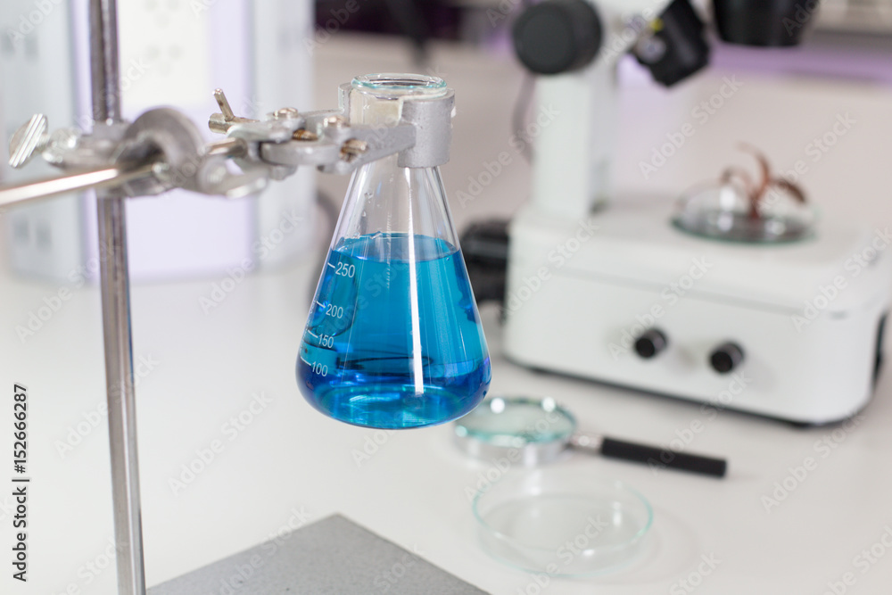 Scientist researching chemistry, technology and biology in laboratory. Scientist researching chemistry, technology and biology in laboratory.