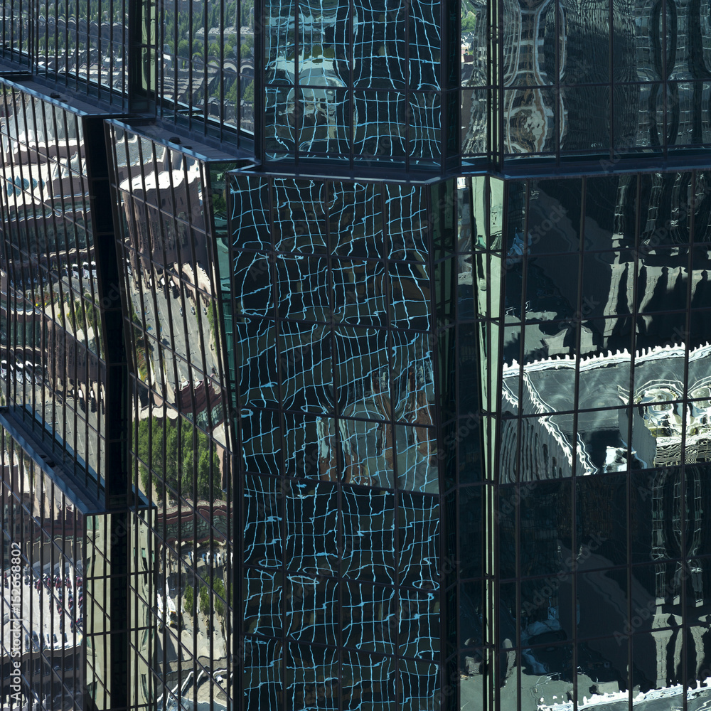 Reflections on modern glass building, Minneapolis, Hennepin County, Minnesota, USA