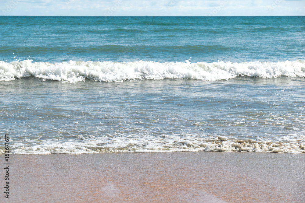 Front view Sea waves and sand beach Front view Sea waves and sand beach