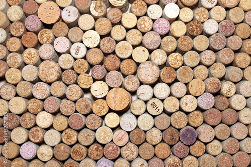 used wine corks   many wine corks   closeup of a wall of used wine corks