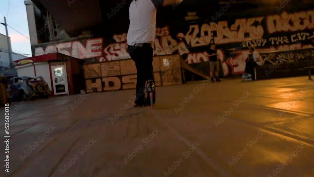 Guy rollerblading in slow motion. Back view of inline skater. Best rollerblade brands. Guy rollerblading in slow motion. Back view of inline skater. Best rollerblade brands.