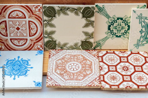 Fotografie Ancient stone Dutch tiles for sale at a flee market