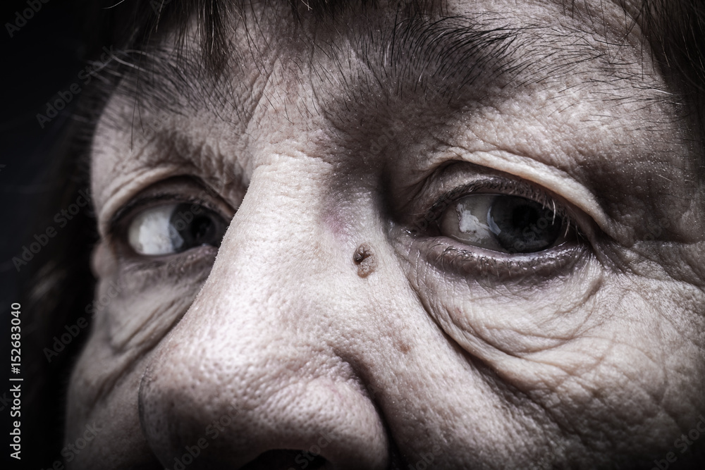 Part of portrait of elderly woman. Eyes. Toned