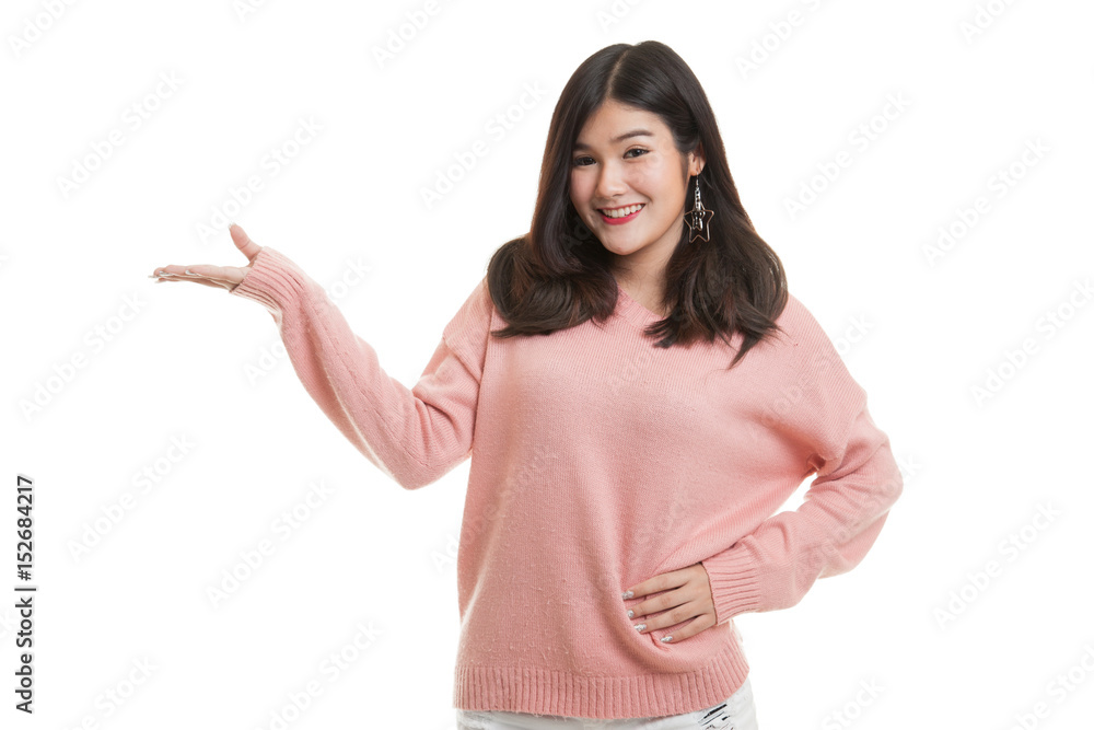 Young Asian woman present with her hand. Young Asian woman present with her hand.