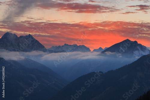 Burning sunset over mountains