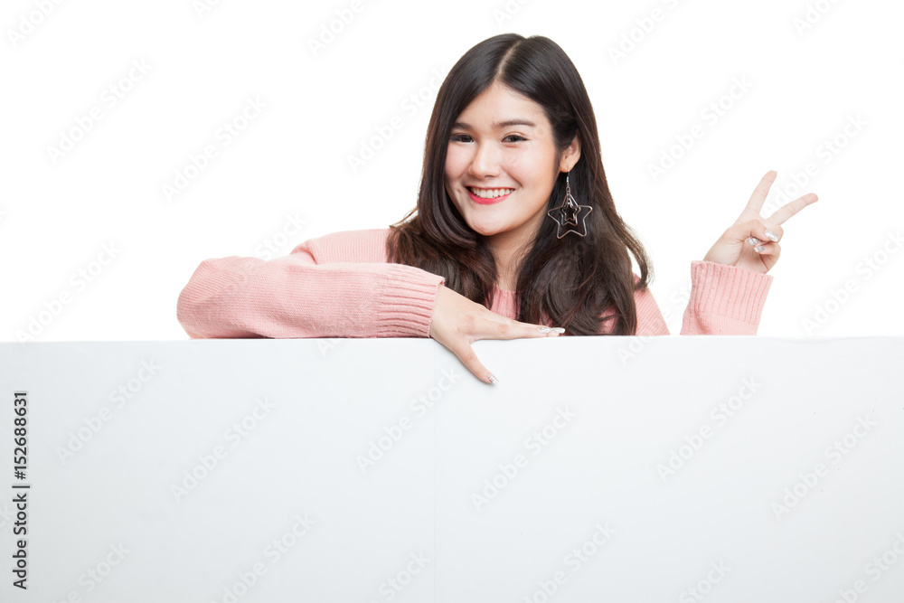 Young Asian woman show victory sign with blank sign. Young Asian woman show victory sign with blank sign.