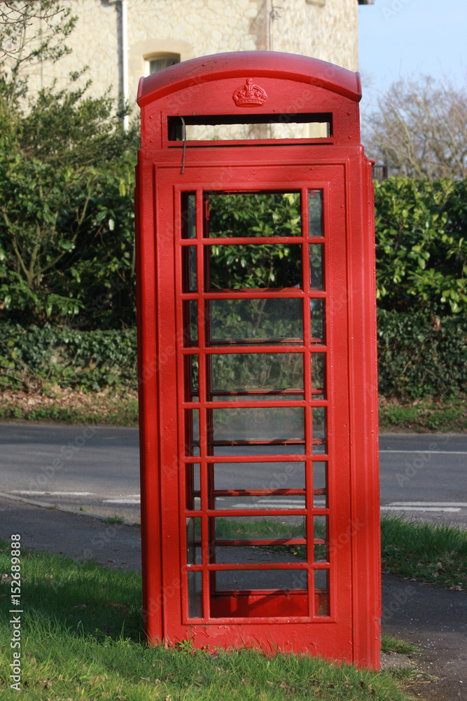 Vertical shot of an old British red telephone box Vertical shot of an old British red telephone box