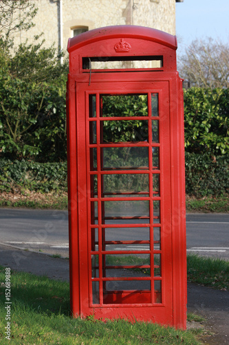 Vertical shot of an old British red telephone box © Nicky Rhodes
