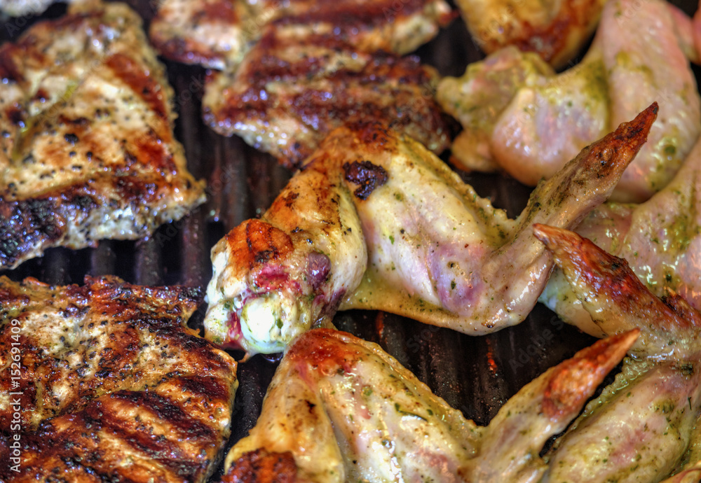 Baking fresh meat on grill closeup Baking fresh meat on grill closeup