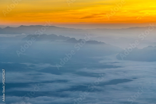 Mountain layer with fog and cloud at dawn