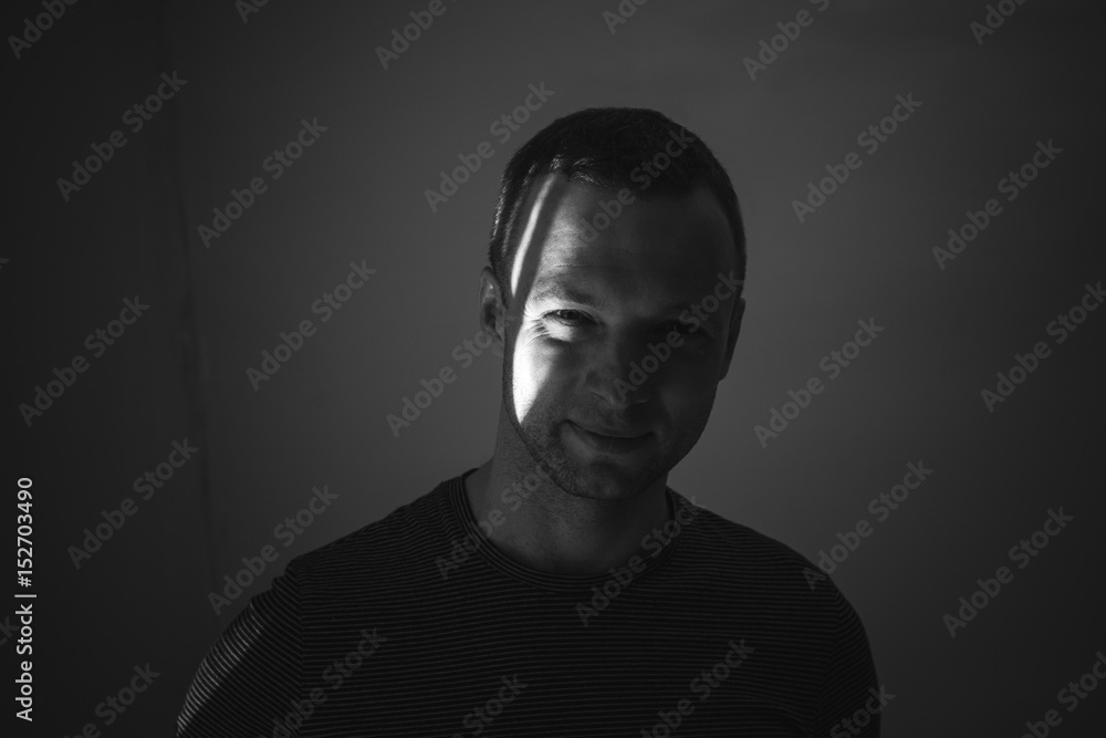 Naklejka premium Artistic studio portrait of young adult man