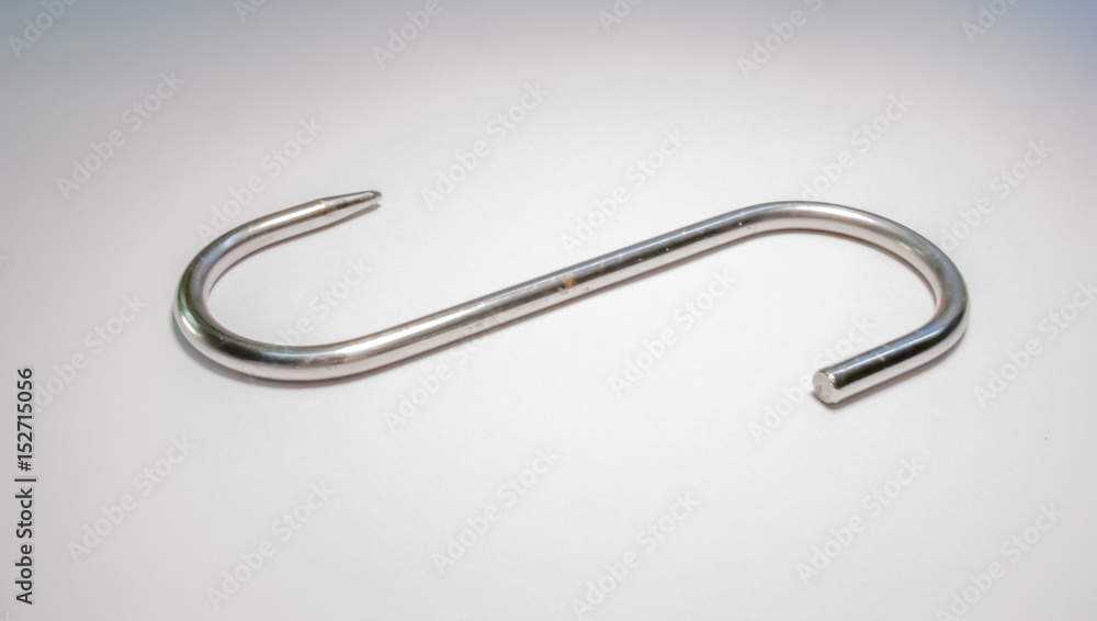 stainles steel meat hook on white