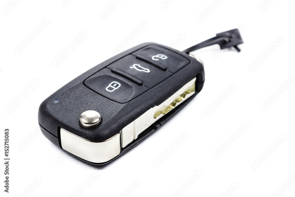 Closed ignition key with immobilizer on a white background Closed ignition key with immobilizer on a white background