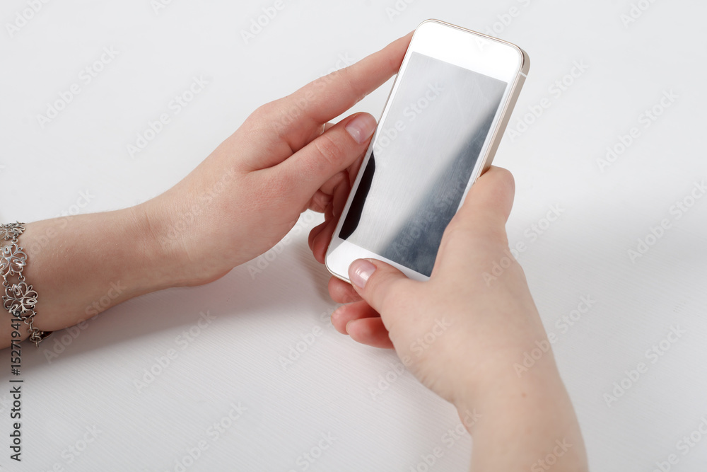 The phone is in the hand with the screen in the camera The phone is in the hand with the screen in the camera