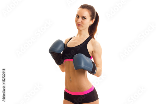 girl in black top poses on cam in boxing gloves © ponomarencko