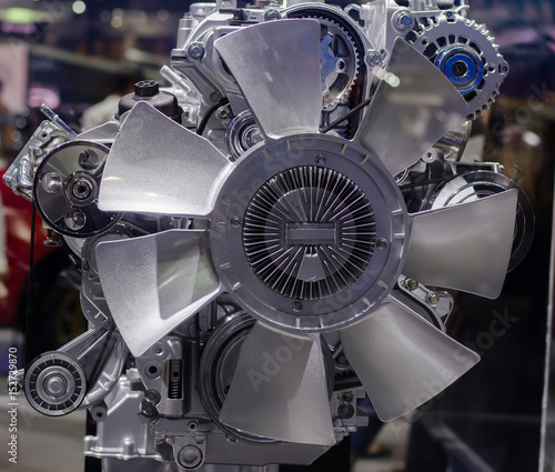 New engine fan of the modern car.The car engine,A fragment of the engine,
