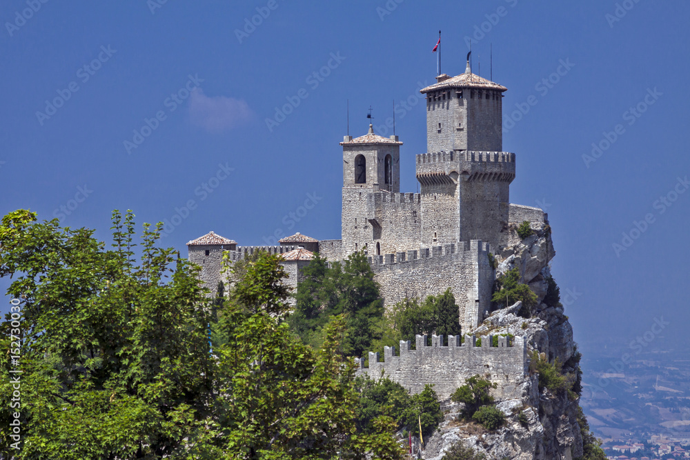 Italy - San Marino - Towers and walls of Fortress of Guaita, one of three castles of San Marino and UNESCO World Heritage site