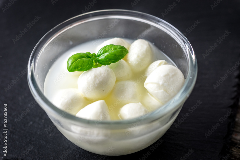 Mini mozzarella cheese in a bowl Mini mozzarella cheese in a bowl