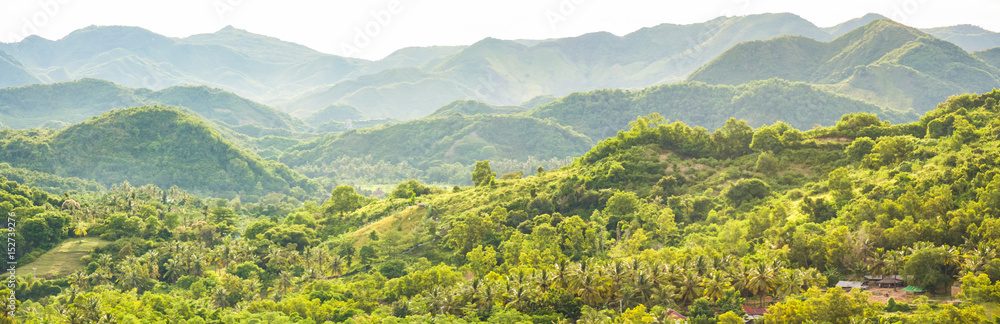 Panoramic view of the green hills and mountain village