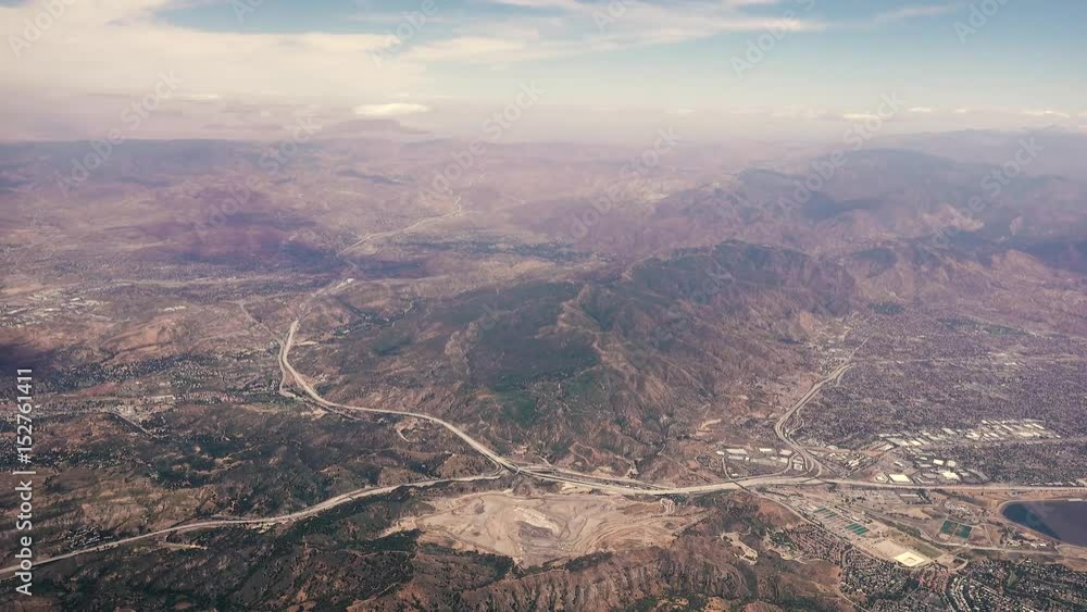 Flight leaving San Fernando Valley in California and heading along Interstate 5 Northbound Flight leaving San Fernando Valley in California and heading along Interstate 5 Northbound