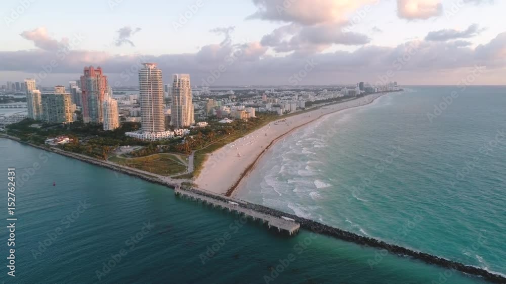Aerial Miami Flying Away From South Pointe Park Beach During Morning Pink Sunrise Aerial Miami Flying Away From South Pointe Park Beach During Morning Pink Sunrise