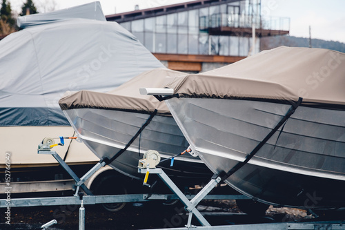 Boat storage facility. power boats shrink wrapped.