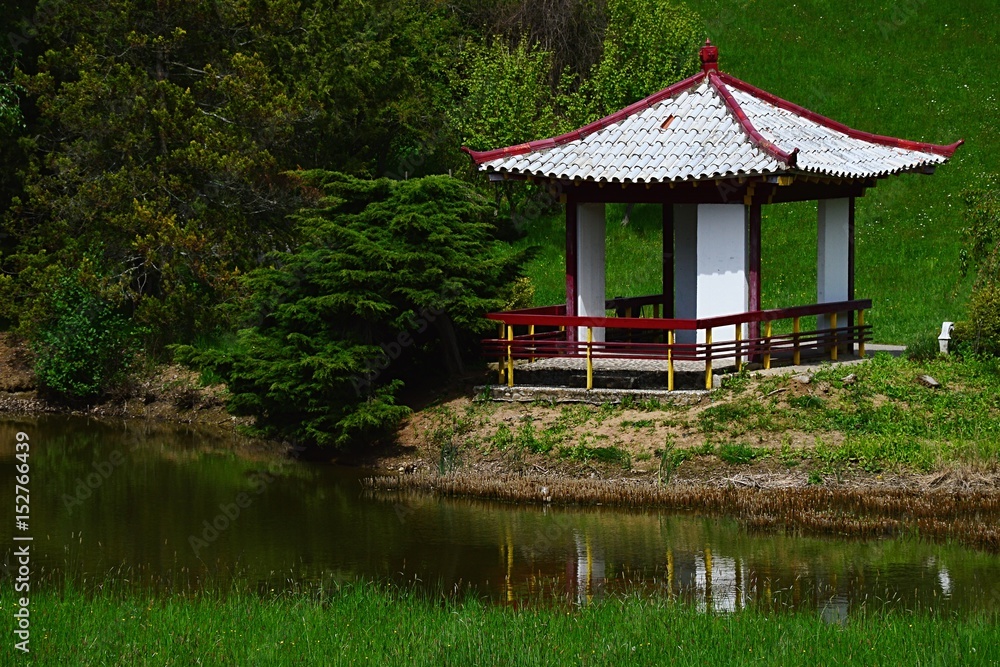 Small chinese pavilion at the garden pond in Arboretum Mlynany, Slovakia Small chinese pavilion at the garden pond in Arboretum Mlynany, Slovakia