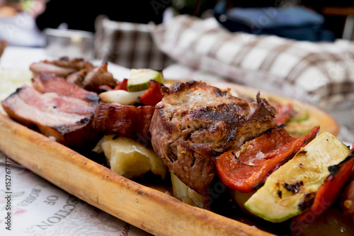 Serbian specialities known as rostilj include grilled pork neck, beef steak and vegetables 