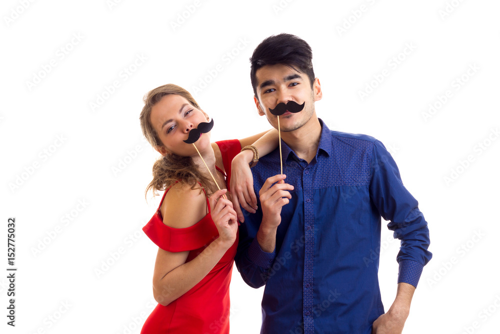 Young couple with cardboard sticks Young couple with cardboard sticks