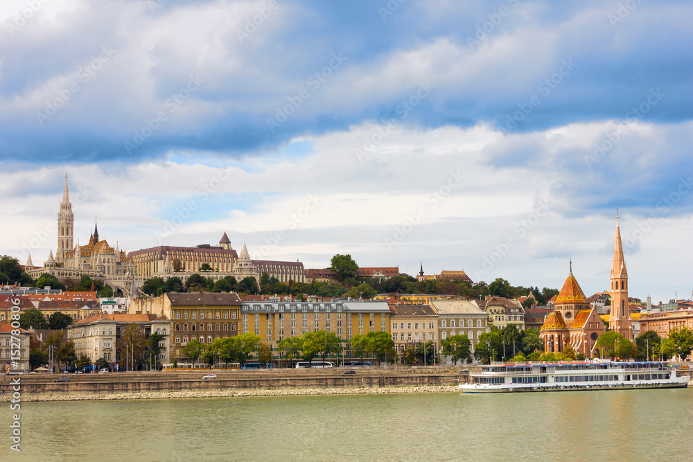 View of the Buda side of Budapest on a sunny day by the Danube river