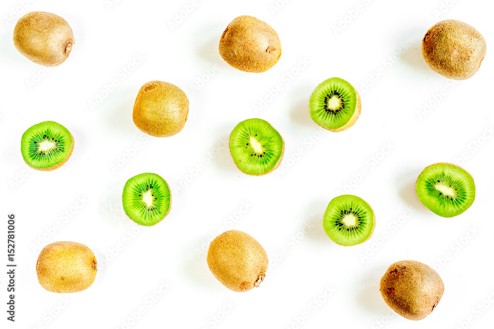exotic fruit pattern with sliced kiwi on white table background top view