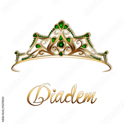 Diadem or crown made of gold and precious stones, emeralds on a white background.