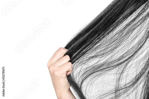 Combing with brush and pulls long hair.Daily preparation for looking nice, Long Disheveled Hair,Holding Messy Unbrushed Dry Hair In Hands.Hair Damage,Health And Beauty Concept,unhappy with dry hair