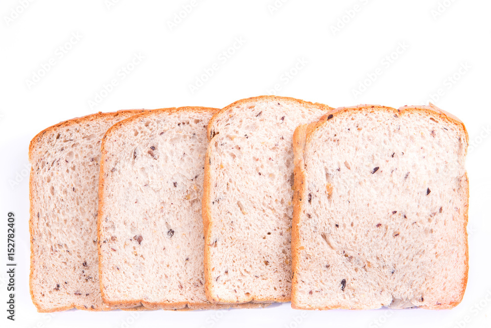 whole wheat bread cut into pieces, isolated on white background whole wheat bread cut into pieces, isolated on white background