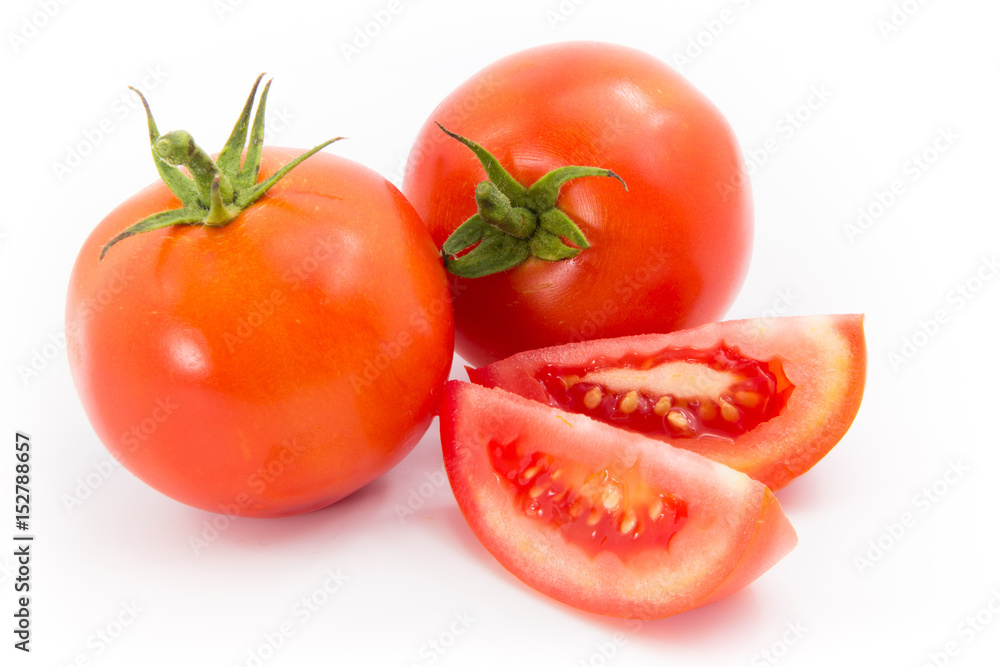 red tomato vegetable with slice isolated on white background red tomato vegetable with slice isolated on white background